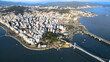 © APStock - Panoramic aerial view of downtown Florianópolis, Santa Catarina, Brazil, with Praça da Luz, bridges, and the capital's urban area, Baira Mar Norte District, seen from above