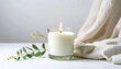 © Lalan - Tranquil spa setting with fragrant candles and fresh flowers for a relaxing aromatherapy treatment