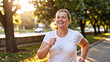 © miracle - Plus-Size Woman Jogging on Beach Path at Sunset, Healthy Lifestyle, Fitness, Body Positivity