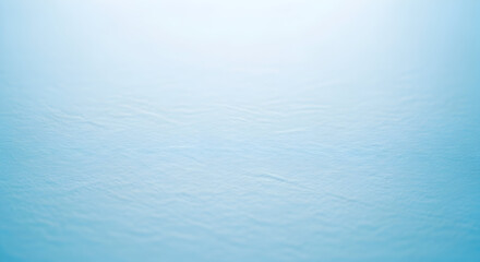 Light blue crumpled paper texture background with vignette