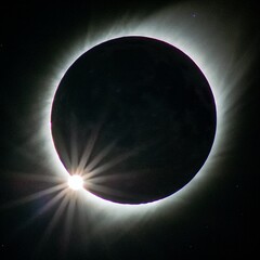 Wall Mural - Dramatic view of a lunar eclipse featuring a glowing blood moon in vibrant red and orange tones.