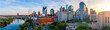 Panoramic view of Nashville skyline at sunset with river, skyscrapers, and city landmarks