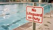 © Dylan - Swimming pool with a 'No Lifeguard on Duty' warning sign in the foreground.