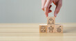 © Sutthiphong - Change management process concept with hand arranging wooden blocks showing strategy, growth, learning, leadership, and teamwork icons, symbolizing organizational transformation, business improvement
