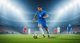 Professional soccer player in a blue uniform dribbling a ball in a large stadium