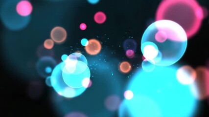 Wall Mural - colorful glowing bokeh light circles in blue pink orange create vibrant abstract background with sof