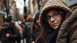 © Nadiya - Casual autumn city portrait, warm mood, young woman in a cozy coat with glasses, street background