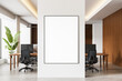 © ImageFlow - Modern office interior with blank poster mockup on white wall in front of wood-accented workspace and ergonomic chairs. 3D Rendering
