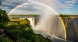 Majestic Rainbow over Victoria Falls in Africa.