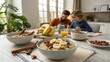 © Anatolii - Family enjoys a healthy breakfast together with oatmeal, fruits, and nuts in a cozy dining area filled with natural light