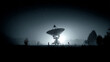 © Tohamina - Radio telescope at night under a starry sky illuminated by a bright light