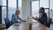 © stockbusters - Two nervous startupers arguing at panoramic cabinet. Man shouting businesswoman