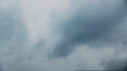 Wall Mural - Time lapse of dark sky with storm clouds