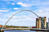 Millennium Bridge with Baltic Centre and River Tyne in Newcastle upon Tyne, UK.