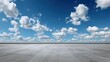 © Zarana  - Ultra quality 8K resolution smooth concrete surface in luxury parking lot under bright blue sky with fluffy clouds. open space creates serene and expansive atmosphere