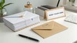 © ZURIANI - Organized Workspace with Letters, Envelopes, and Office Supplies