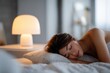 © Elena - Woman sleeping peacefully in bed. Comfortable sleep concept for relaxation and wellness. Ideal for health and beauty articles.