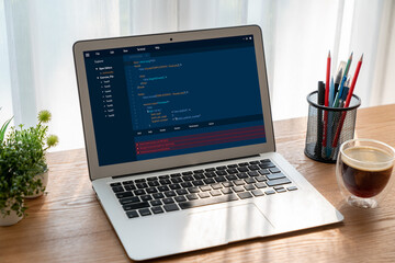 Software development programming on computer screen for modish application and program coding