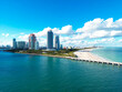 Miami Beach aerial drone view with skyline. Miami from above. Drone view of Miamis famous landmarks. South Pointe beach with skyscrapers. Miami city panorama. Skyline of Miami Beach.