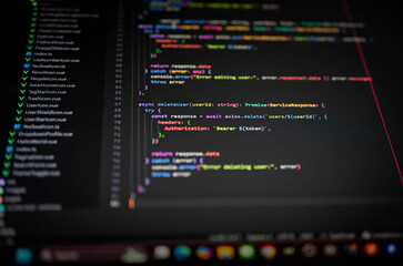 close-up of colorful programming code on a computer screen showing deleteuser function with authoriz