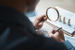 © Garun Studios - Businessman using magnifying glass to review financial documents on desk. Perfect for concepts of accounting, audit, tax, compliance, fraud detection, financial report, accuracy, and data analysis.