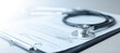© Garun Studios - Stethoscope on medical document symbolizing health insurance, diagnosis, and patient care. Perfect for concepts of healthcare policy, hospital record, treatment, medical service, and protection.
