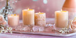 © Hijab - Warm glowing candles on a decorative tray with soft pink roses and delicate blossoms, creating a serene ambiance.
