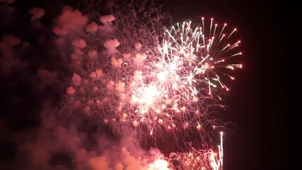 Fireworks exploding at night with smoke, celebration background, event