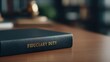 © Wan - Fiduciary duty book on wooden desk, symbolizing trust and responsibility in legal matters. warm lighting creates professional atmosphere