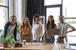 © Bliss - Stylish young coworkers collaborating creatively in a modern office space