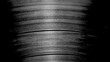 © Arthur - textured close up of vintage vinyl record grooves in dramatic black and white lighting for abstract wallpaper or editorial background