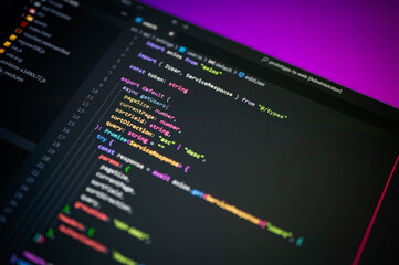 TypeScript programming code in a dark mode editor with colorful syntax, used for modern web development, coding education, and software engineering in a creative and digital tech environment.