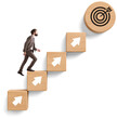© ImageFlow - Businessman climbs wooden blocks with white arrows aiming at a target icon, isolated on white background, symbolizing goal achievement and career progress