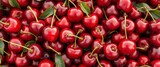 Abundant ripe sweet cherries viewed from above, showcasing vibrant red hues and juicy texture,  texture,  overhead shot