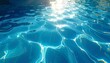 © AbuHamzah - Sparkling Turquoise Water Surface Close-Up of Sunlight on Rippling Pool Water for Serenity