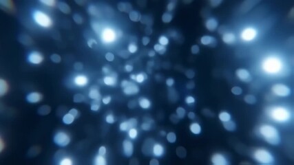 Abstract bokeh lights in a dark blue background