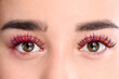 © New Africa - Young woman with beautiful colorful eyelashes, closeup