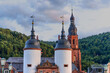 Historic Old Bridge Gate With Tower Against Green Hills In Heidelberg Germany