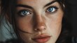 © Alex Piatkowski - Close-up of a young woman with striking blue eyes and freckles, showcasing natural beauty and emotion indoors