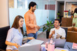 © Moy Ortega/Stocksy - A coworking office with several coworkers living happily together