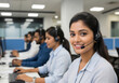 © littlepearlstock - Call Center Employees Working at Desks with Headsets