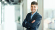 © Prostock-studio - Successful Business People. Businessman At Corporate Meeting Smiling To Camera Standing In Modern Office. Empty Space