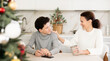 © JackF - Mother and son discussing something on New Year holidays