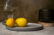 © Helen Rushbrook/Stocksy - Natural light still life with lemons