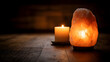 © Lucianastudio - Warm ambiance with Himalayan salt lamp and glowing candle creating a serene and inviting mood for relaxation and mindful living home wellness therapy and spiritual practice