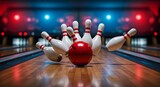 Close-up shot of a red bowling ball striking tenpins in a dimly lit bowling alley with vibrant blue and red lighting, capturing the dynamic action and excitement of the