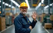 © Ryan - Portrait of senior industry worker standing in facility and gesturing okay at the camera. High quality