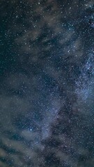Wall Mural - Vertical Milky Way Galaxy and Clouds Stargazing August Southwest Sky Time Lapse Astrophotography