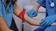 © kinomaster - Healthcare Professional Preparing for Blood Collection Procedure Carefully
