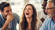© ZHMPRO - A diverse group of friends laughing heartily together, sharing a moment of joy and connection in a casual setting